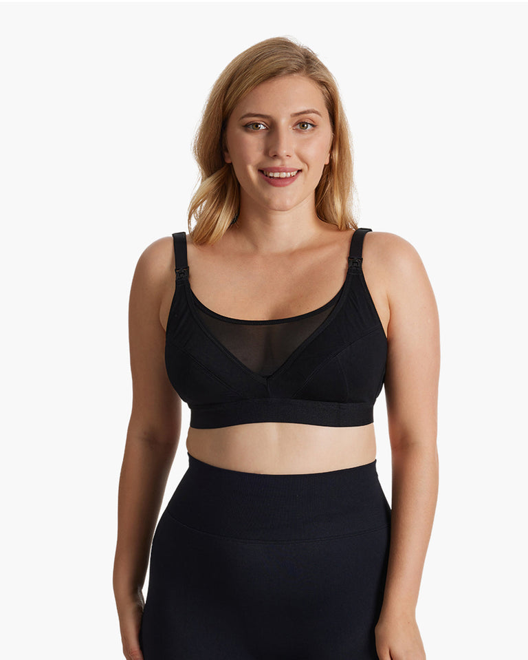 Translation missing: en.Woman wearing a black ultra-soft and cool breeze pumping and nursing bra HF018 by Momcozy, showcasing adjustable straps and comfortable design. New product badge displayed on top-right corner
