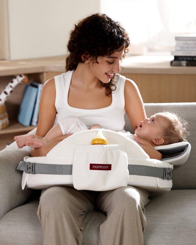 Translation missing: fr.Momcozy memory foam nursing pillow supporting baby, white with bottle pocket